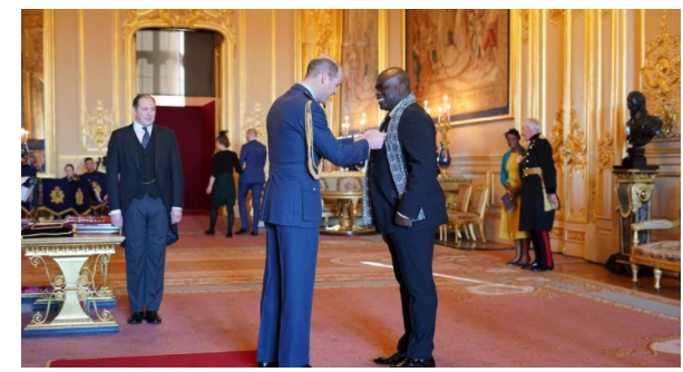 Queen Elizabeth II Bestows An OBE On Gospel Singer Muyiwa Olarewaju