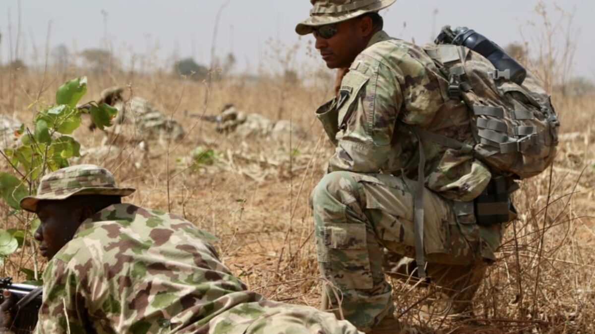 US Soldiers & DSS Agents Arrest A Suspected Terrorist In An Abuja Estate